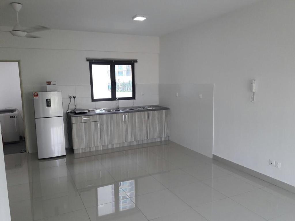 Living and dining area inside the unit at Avantas Residences