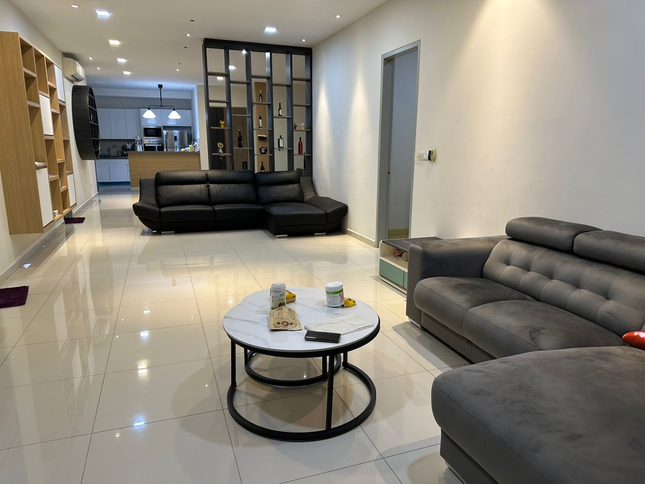 Living and dining area, with the kitchen visible beyond